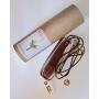 Plant Hugger Leather Plant Hanger with Brass Accents.