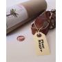 Plant Hugger Leather Plant Hanger with Brass Accents.