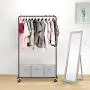 Simple Trending Clothes Garment Rack, Clothing Rolling Rack with Mesh Storage Shelf on Wheels, Bronze Simple Trending Clothes Garment Rack, Clothing Rolling Rack with Mesh Storage Shelf on Wheels, Bronze