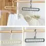 Highway 2pcs Magic Clothes Hanger Organizer,Multifunction Space Saving Hangers,Sturdy Plastic,Standard Hangers,Foldable Storage Coat Hangers (Grey) Highway 2pcs Magic Clothes Hanger Organizer,Multifunction Space Saving Hangers,Sturdy Plastic,Standard Hangers,Foldable Storage Coat Hangers (Grey)