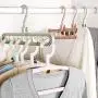 wenirn Magic Clothes Hanger Organizer, Rotate Anti-Skid Folding Hanger with Space Saving and Cascading Features, Pack of 5 Standard Hangers with 9 Holes for Drying and Storage, Random Color