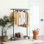 SONGMICS Clothing Garment Rack on Wheels, Heavy-Duty Clothes Rack, Collapsible, with Extendable Hanging Rail, Bottom Storage Shelf, Black UHSR13BK