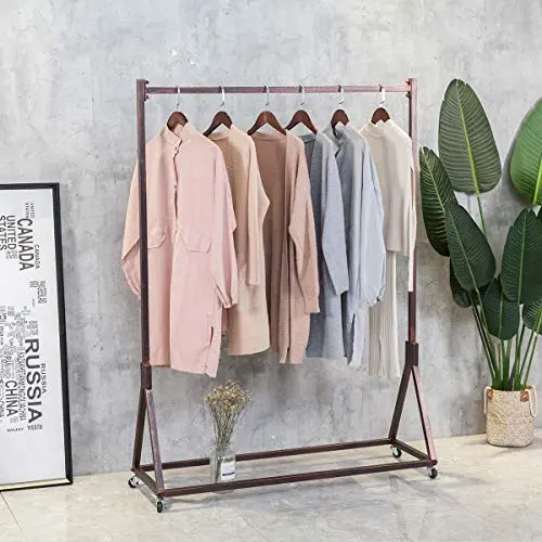 FURVOKIA Modern Simple Heavy Duty Metal Rolling Garment Rack with Wheel,Retail Display Clothing Rack,Wrought Iron Single Rod Floor-Standing Hangers Clothes Shelves (Red Copper Square Tube, 47.2 L) FURVOKIA Modern Simple Heavy Duty Metal Rolling Garment Rack with Wheel,Retail Display Clothing Rack,Wrought Iron Single Rod Floor-Standing Hangers Clothes Shelves (Red Copper Square Tube, 47.2 L)