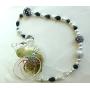 Pearl, black, and silver beaded airplant hanger