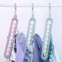 ENWORLD Magic Hangers Organizer 4 Pack Rotating Space Saving Hangers for Clothes Multi Functional Nine-Hole Closet Space Saver with Sturdy Plastic,Random Color
