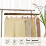 SONGMICS 12-Pack Pants Hangers, Heavy-Duty Pants Hangers with Clips, Premium Wood Skirt Hangers, Space-Saving, 360° Swivel Hooks, 14 Inches Long, Dark Walnut and Rose Gold UCRW10V