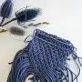Macrame wall hanging banner. Blue bunting hanger. Macrame wall hanging banner. Blue bunting hanger.