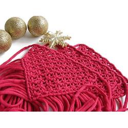 Macrame wall hanger. Red Christmas banner.